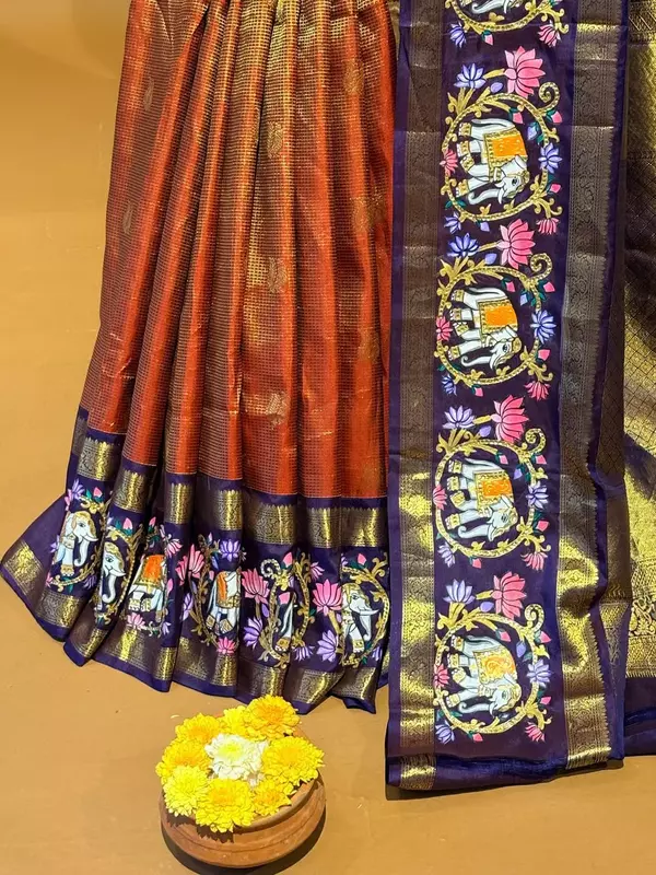 Orangish red vaira oosi checks vintage kanjeevaram saree with tanjore art